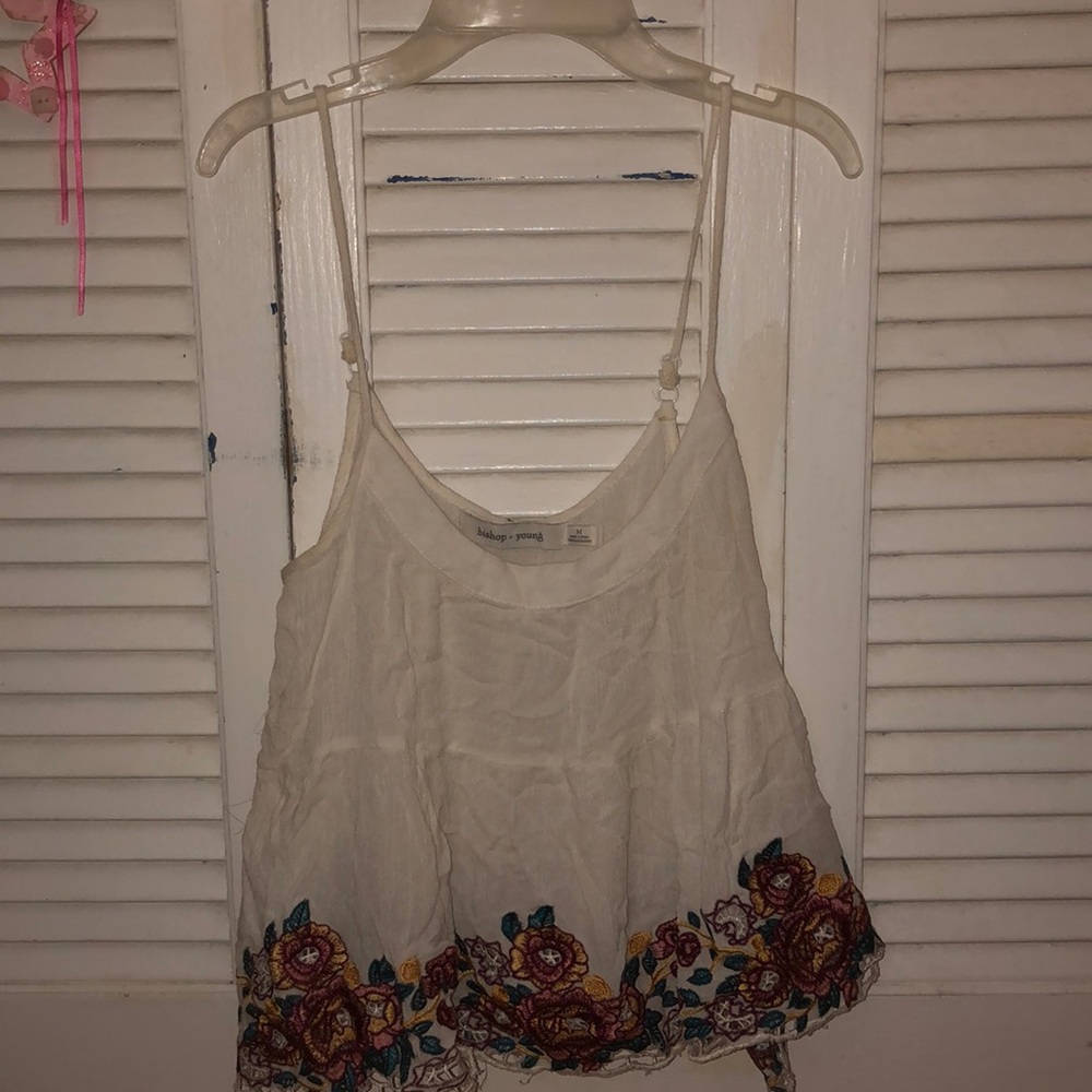 White tank top with lace and flowers on bottom